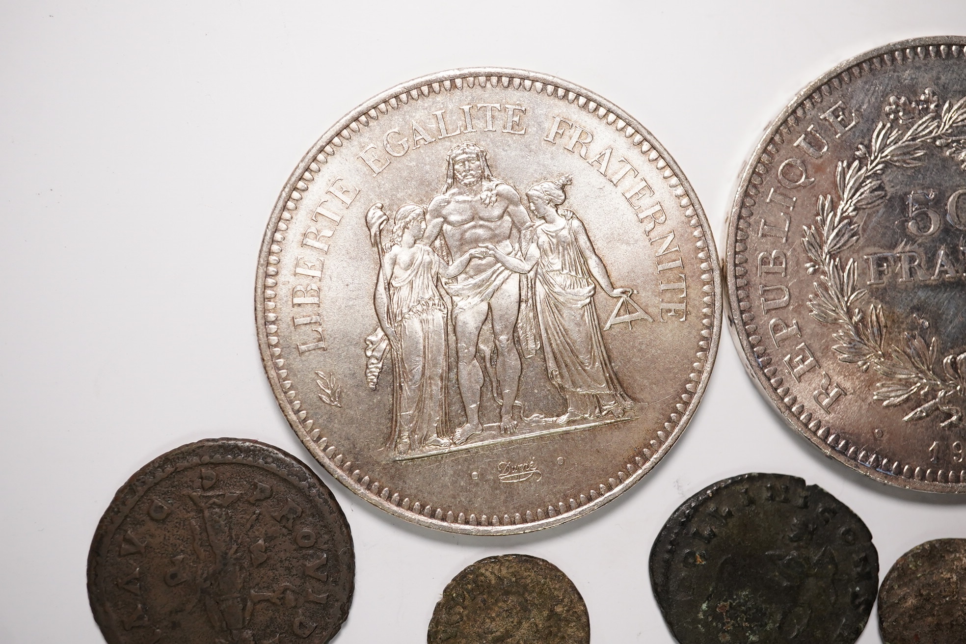 Two fifty Franc silver coins and four Roman AE coins. Condition - as per images